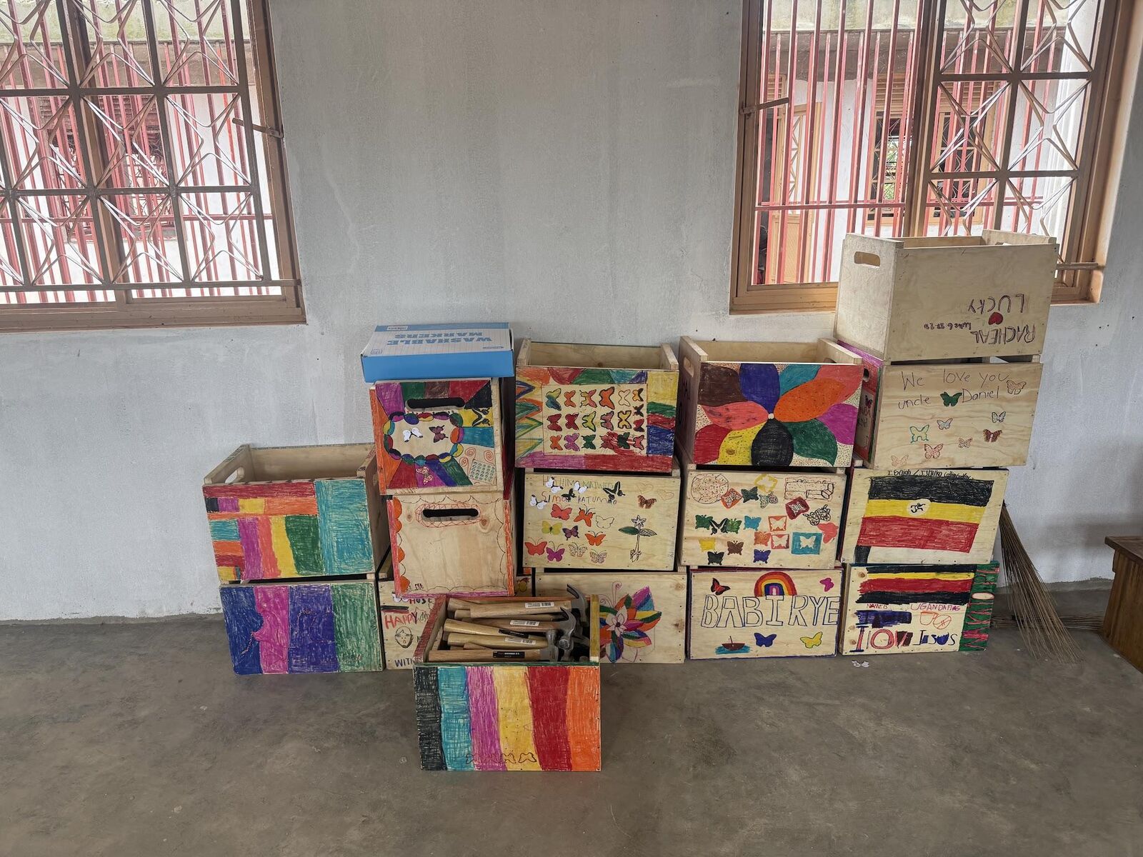 Hand-painted wooden crates made by students