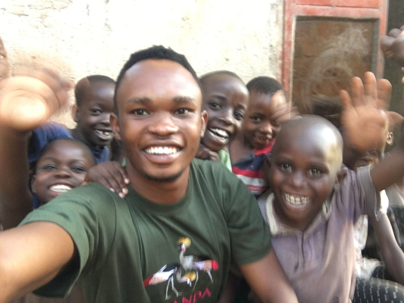 Peter Muwambi with the children of Sanyuka Children's Ministry